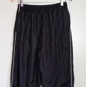 EVR Retro black parachute pants with white piping down the sides jersey lined
